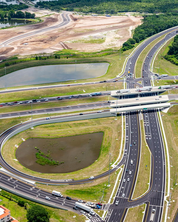 Aerial view of a highway with a side exit